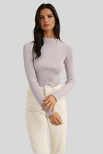 Load image into Gallery viewer, Women’s long sleeve ribbed knit sweater in light lavender, high neck fitted top paired with cream pants
